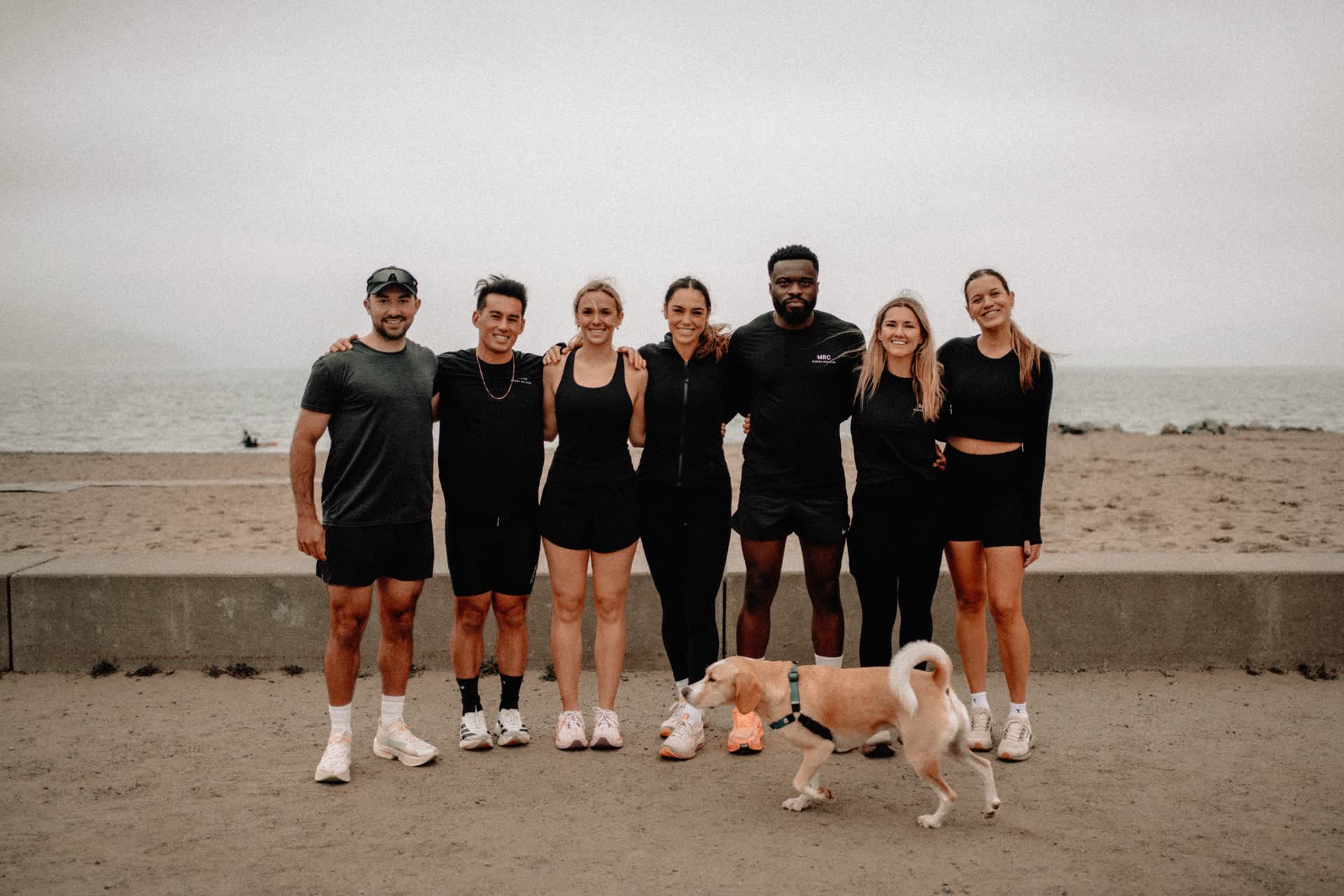 Marina Run Club members together on Marina Beach